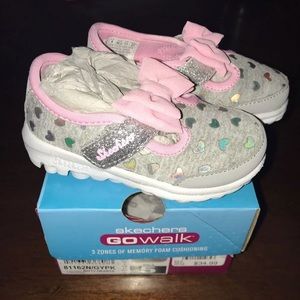 New in box. Toddler girl 5c Sketchers Shoes